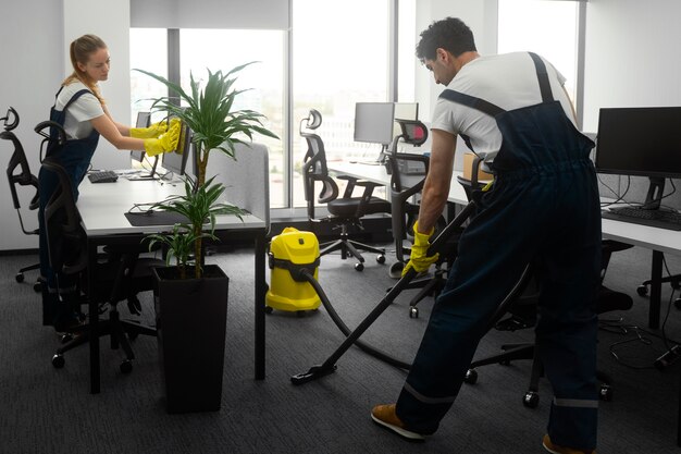 full shot people cleaning office - Super Maid LLC